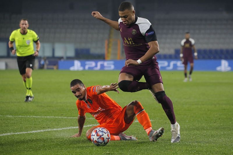 Rafael of Istanbul Basaksehir and Kylian Mbappe of Paris Saint-Germain 